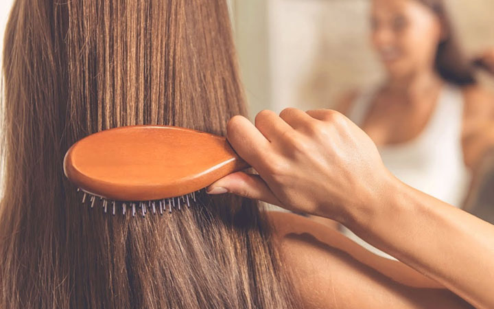 6 Powerful, Natural Ways To Boost Your Hair Growth